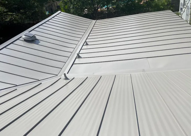 Solar attic fan installed on a metal roof for Roof Ventilation in Murrells Inlet